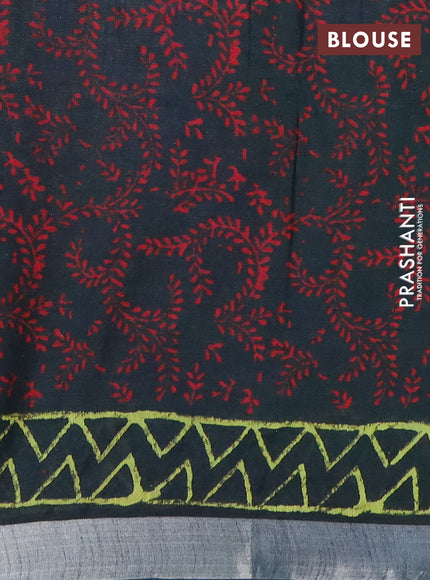 Linen cotton saree bottle green with allover prints and silver zari woven border