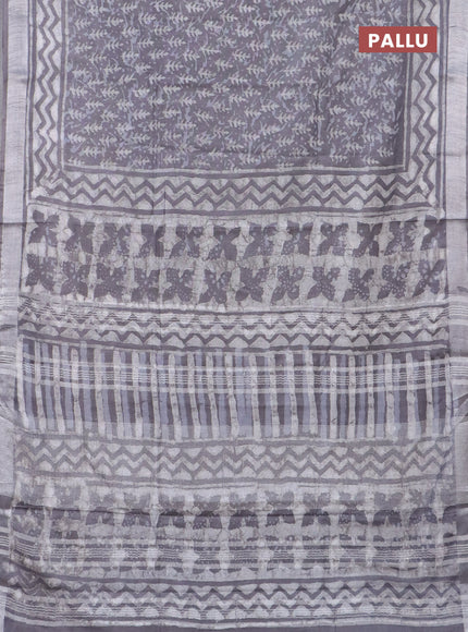 Linen cotton saree grey with allover dabu prints and silver zari woven border