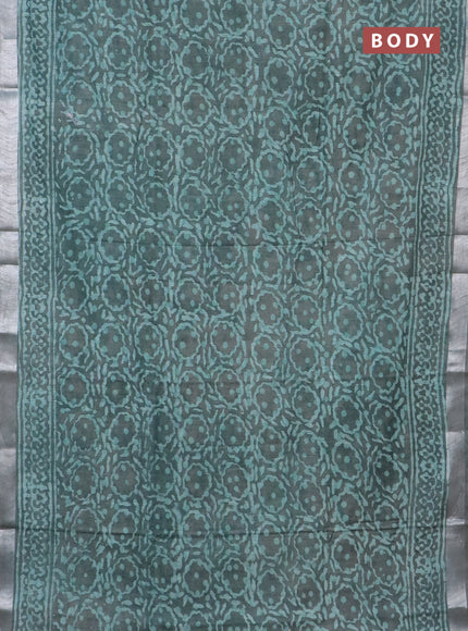 Linen cotton saree greyish green with allover batik prints and silver zari woven border