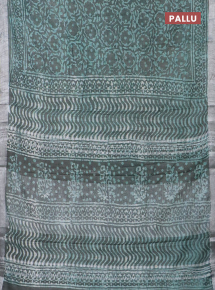 Linen cotton saree greyish green with allover batik prints and silver zari woven border