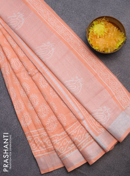 Linen cotton saree peach orange with butta prints and silver zari woven border