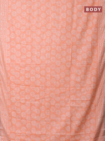 Linen cotton saree peach orange with butta prints and silver zari woven border