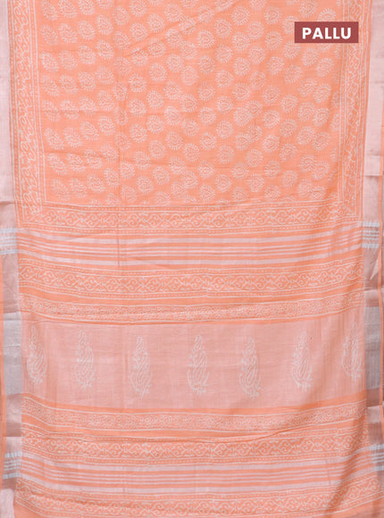 Linen cotton saree peach orange with butta prints and silver zari woven border