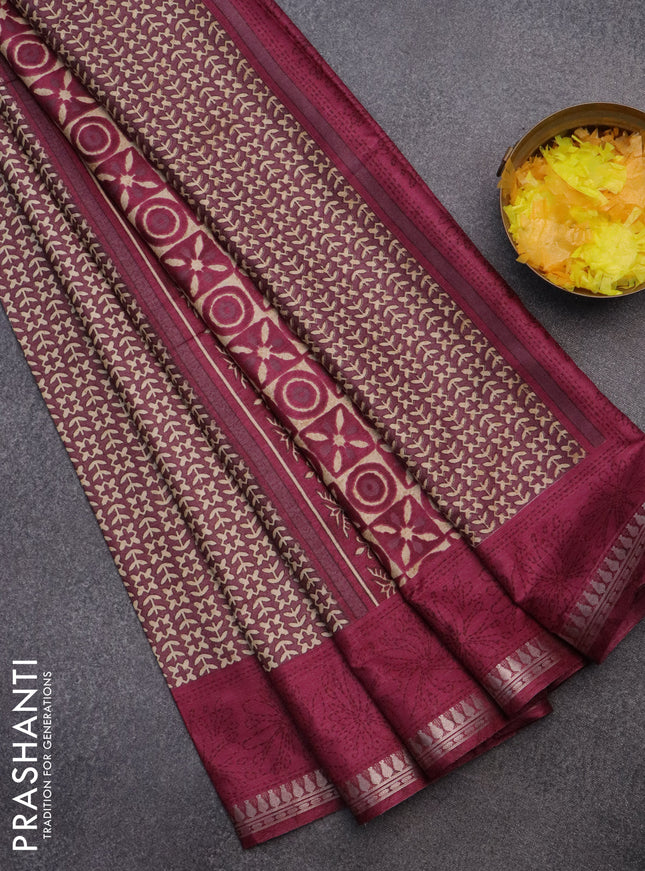 Muslin silk saree wine shade with allover prints and zari woven border
