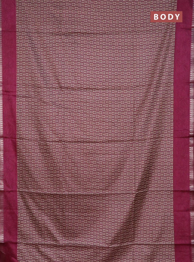 Muslin silk saree wine shade with allover prints and zari woven border