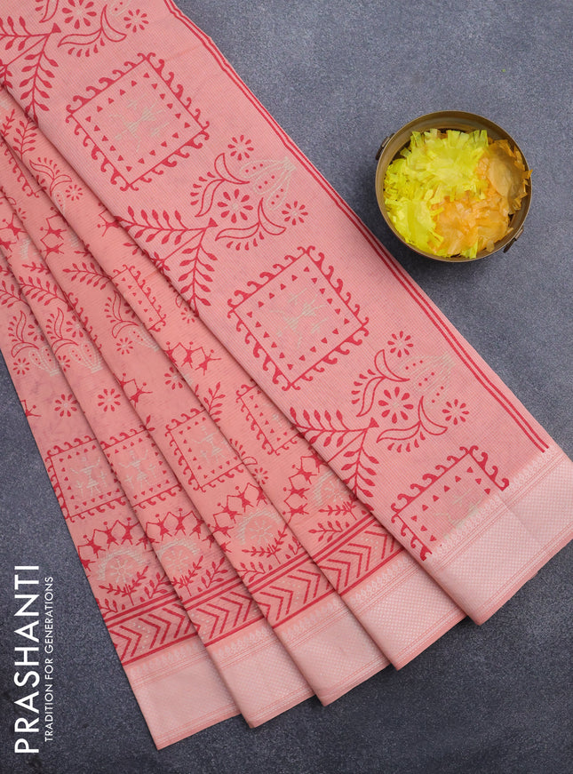 Chirala cotton saree peach orange with allover prints and thread woven border