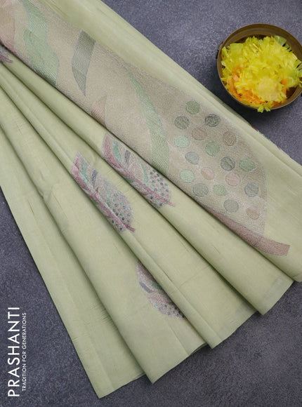 Semi tussar crush saree pista green with leaf embroidery work buttas in borderless style