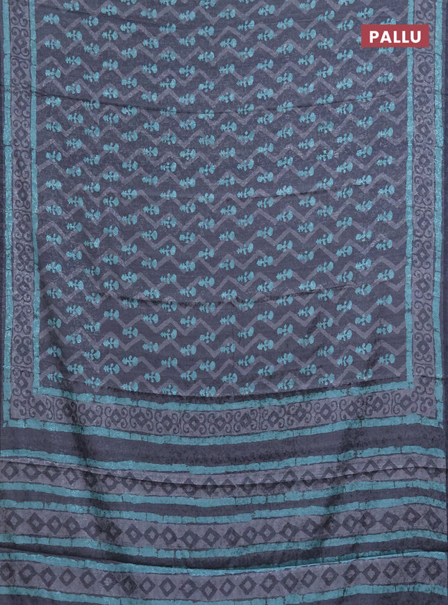 Semi crepe silk saree grey and teal blue with self emboss & butta prints and printed border