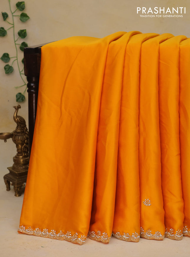 Satin crepe saree mango yellow with beaded work and zardosi work border