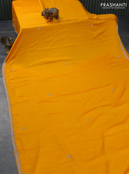 Satin crepe saree mango yellow with beaded work and zardosi work border