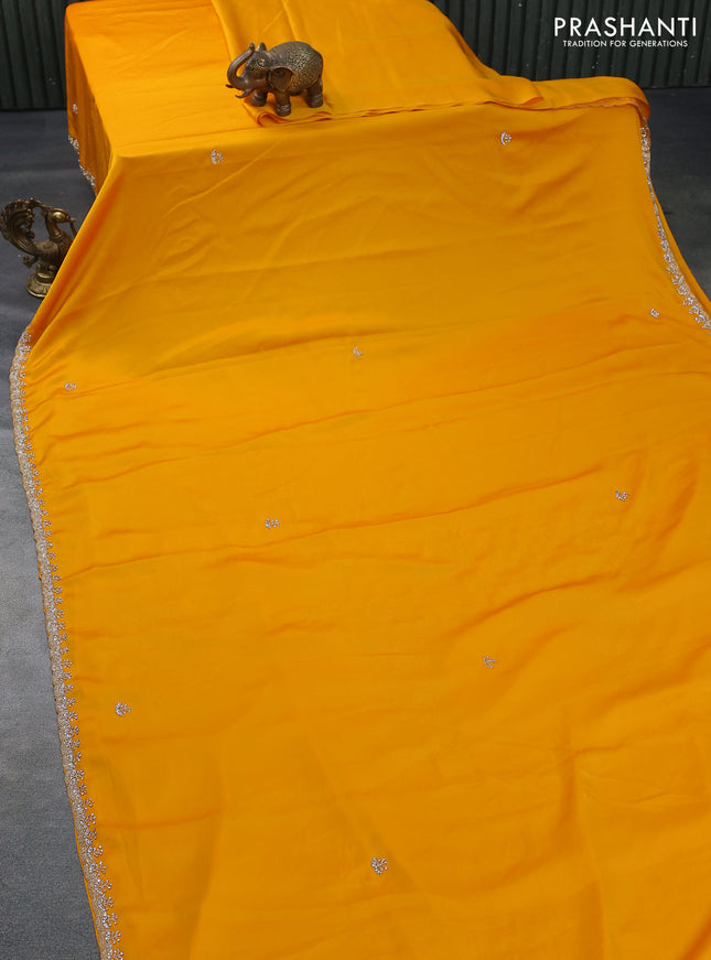 Satin crepe saree mango yellow with beaded work and zardosi work border