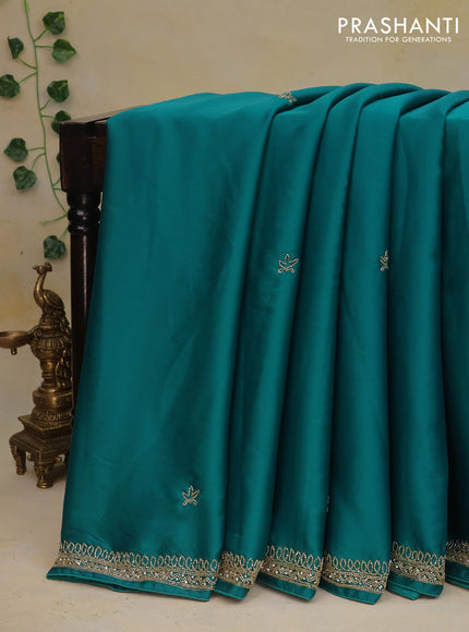 Satin crepe saree teal shade with beaded work and zardosi work border