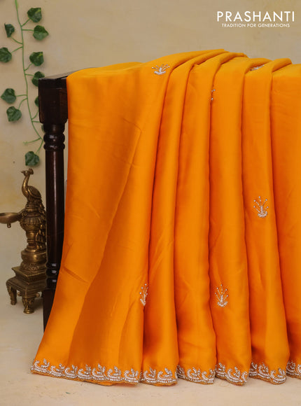 Satin crepe saree mango yellow with beaded work and zardosi work border
