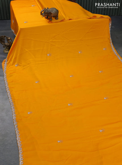 Satin crepe saree mango yellow with beaded work and zardosi work border