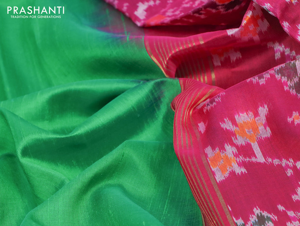 Pure raw silk saree green and magenta pink with plain body and ikat woven pallu