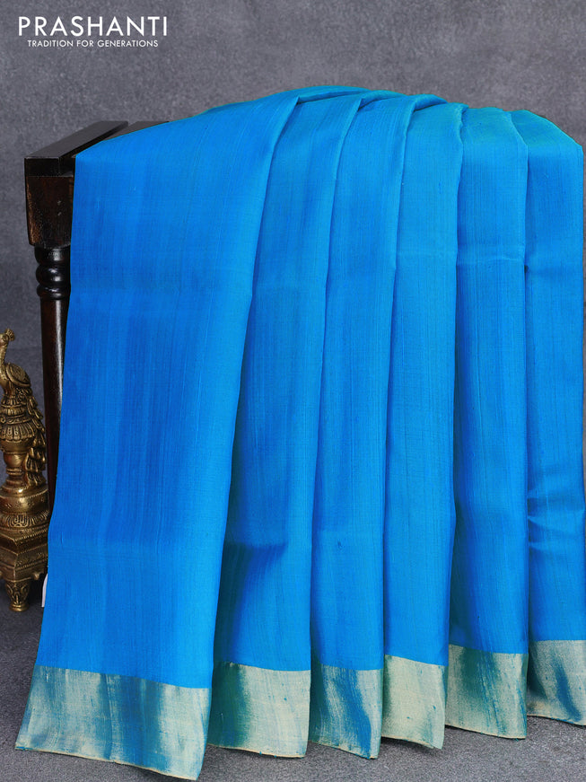 Pure raw silk saree light blue and cs blue with plain body and ikat design pallu