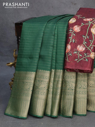 Dola silk saree green and deep maroon with allover zari woven stripes pattern and rich zari woven border