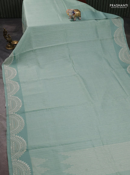 Jute silk saree pastel green with embroidery buttas and embroidery border