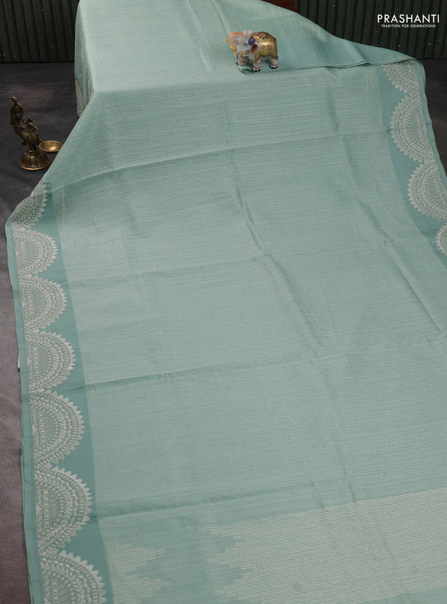 Jute silk saree pastel green with embroidery buttas and embroidery border