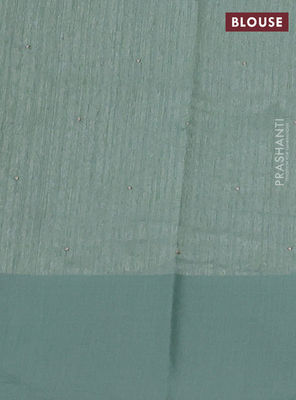 Jute silk saree pastel green with embroidery buttas and embroidery border