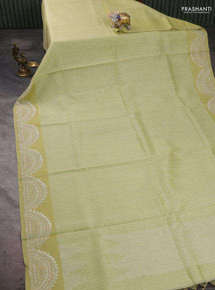 Jute silk saree pista green with embroidery buttas and embroidery border