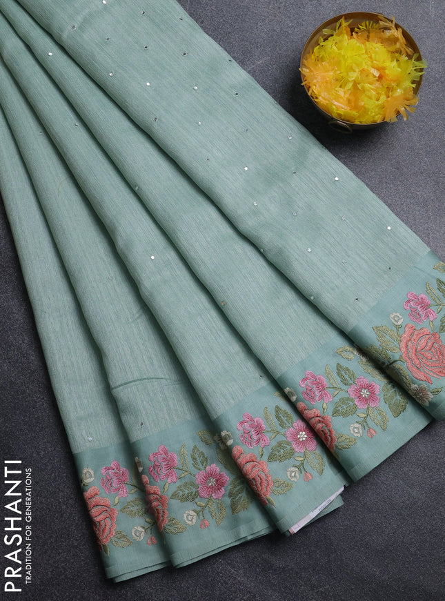 Jute silk saree pastel green with embroidery buttas and floral embroidery butta border