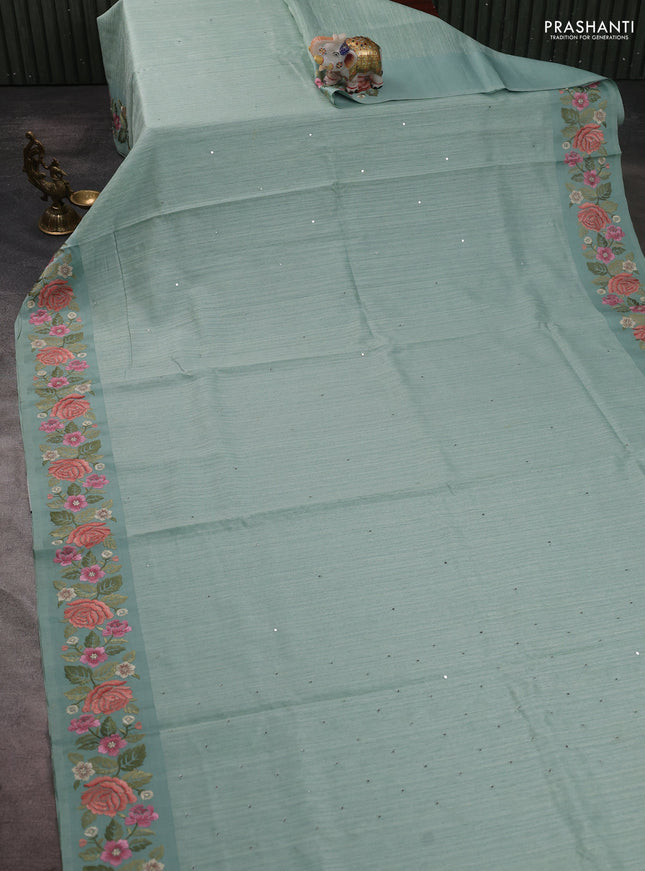 Jute silk saree pastel green with embroidery buttas and floral embroidery butta border