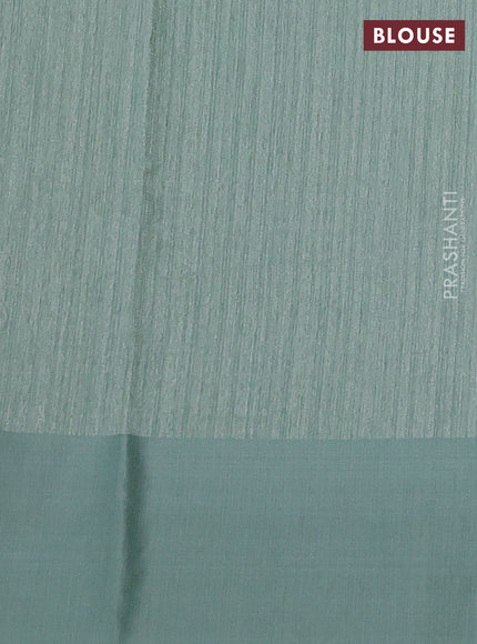 Jute silk saree pastel green with embroidery buttas and floral embroidery butta border