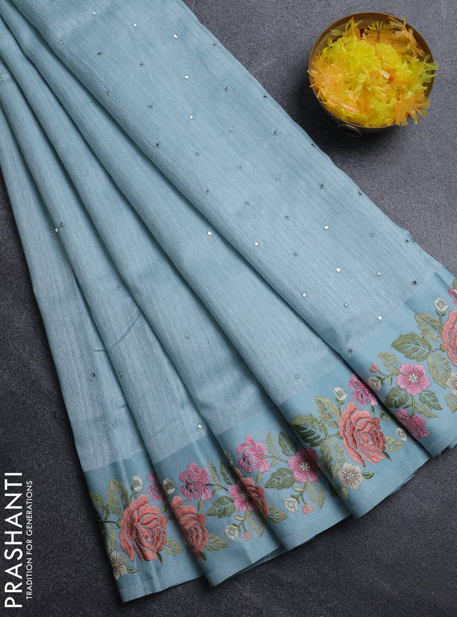 Jute silk saree pastel blue with embroidery buttas and floral embroidery butta border