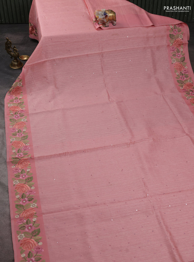 Jute silk saree peach shade with embroidery buttas and floral embroidery butta border
