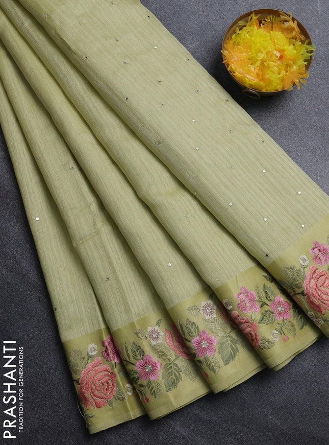 Jute silk saree pista green with embroidery buttas and floral embroidery butta border