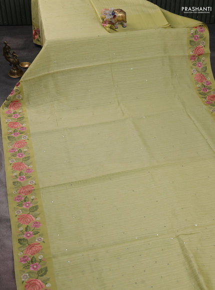 Jute silk saree pista green with embroidery buttas and floral embroidery butta border