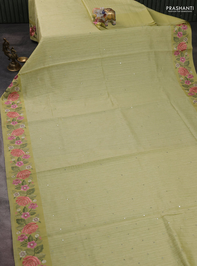 Jute silk saree pista green with embroidery buttas and floral embroidery butta border