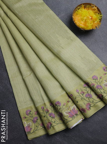 Jute silk saree pista green with embroidery buttas and embroidery border