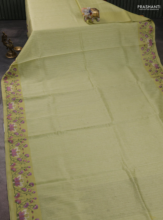 Jute silk saree pista green with embroidery buttas and embroidery border