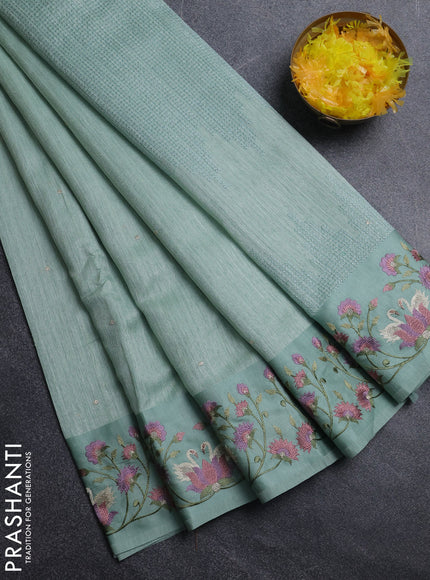 Jute silk saree pastel green with embroidery buttas and embroidery border