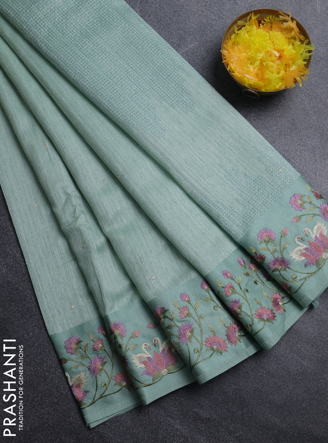 Jute silk saree pastel green with embroidery buttas and embroidery border