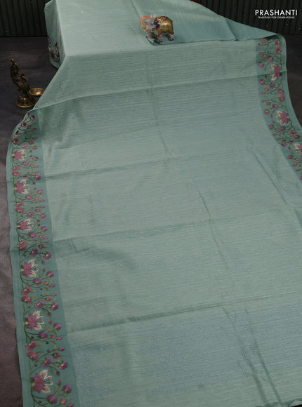 Jute silk saree pastel green with embroidery buttas and embroidery border
