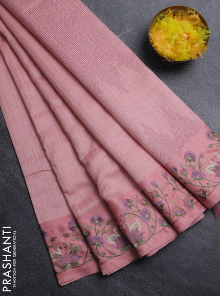 Jute silk saree peach shade with embroidery buttas and embroidery border