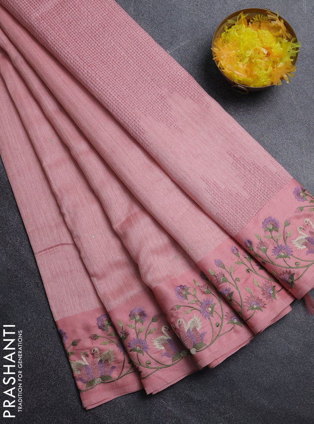 Jute silk saree peach shade with embroidery buttas and embroidery border