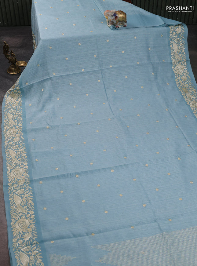 Jute silk saree pastel blue with embroidery buttas and parsi embroidery border