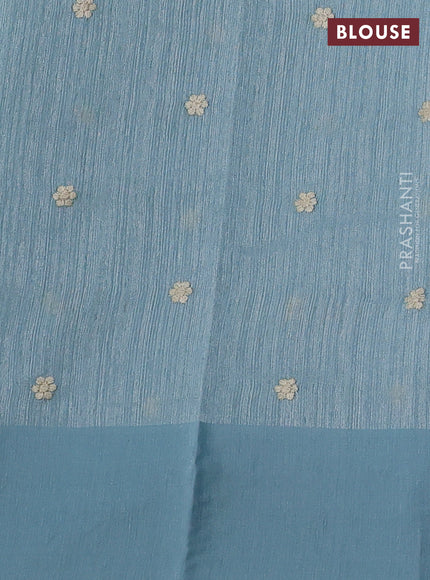 Jute silk saree pastel blue with embroidery buttas and parsi embroidery border