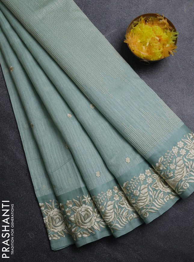 Jute silk saree pastel green with embroidery buttas and parsi embroidery border