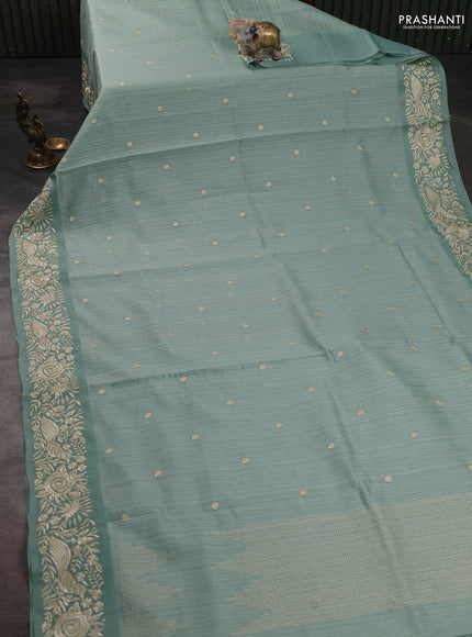 Jute silk saree pastel green with embroidery buttas and parsi embroidery border