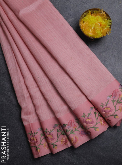Jute silk saree peach shade with embroidery buttas and floral embroidery butta border