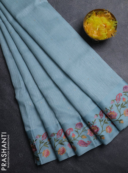 Jute silk saree pastel blue with embroidery buttas and floral embroidery butta border