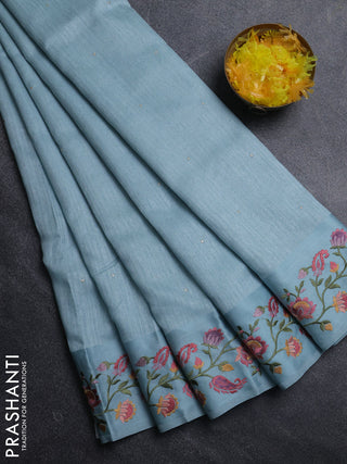 Jute silk saree pastel blue with embroidery buttas and floral embroidery butta border