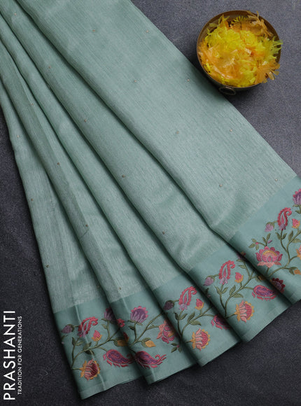 Jute silk saree pastel green with embroidery buttas and floral embroidery butta border