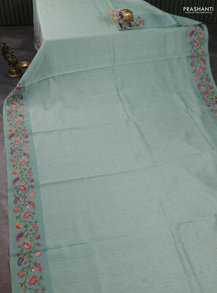 Jute silk saree pastel green with embroidery buttas and floral embroidery butta border