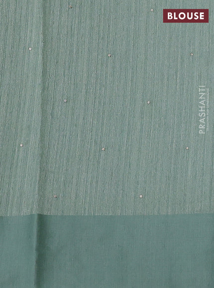 Jute silk saree pastel green with embroidery buttas and floral embroidery butta border